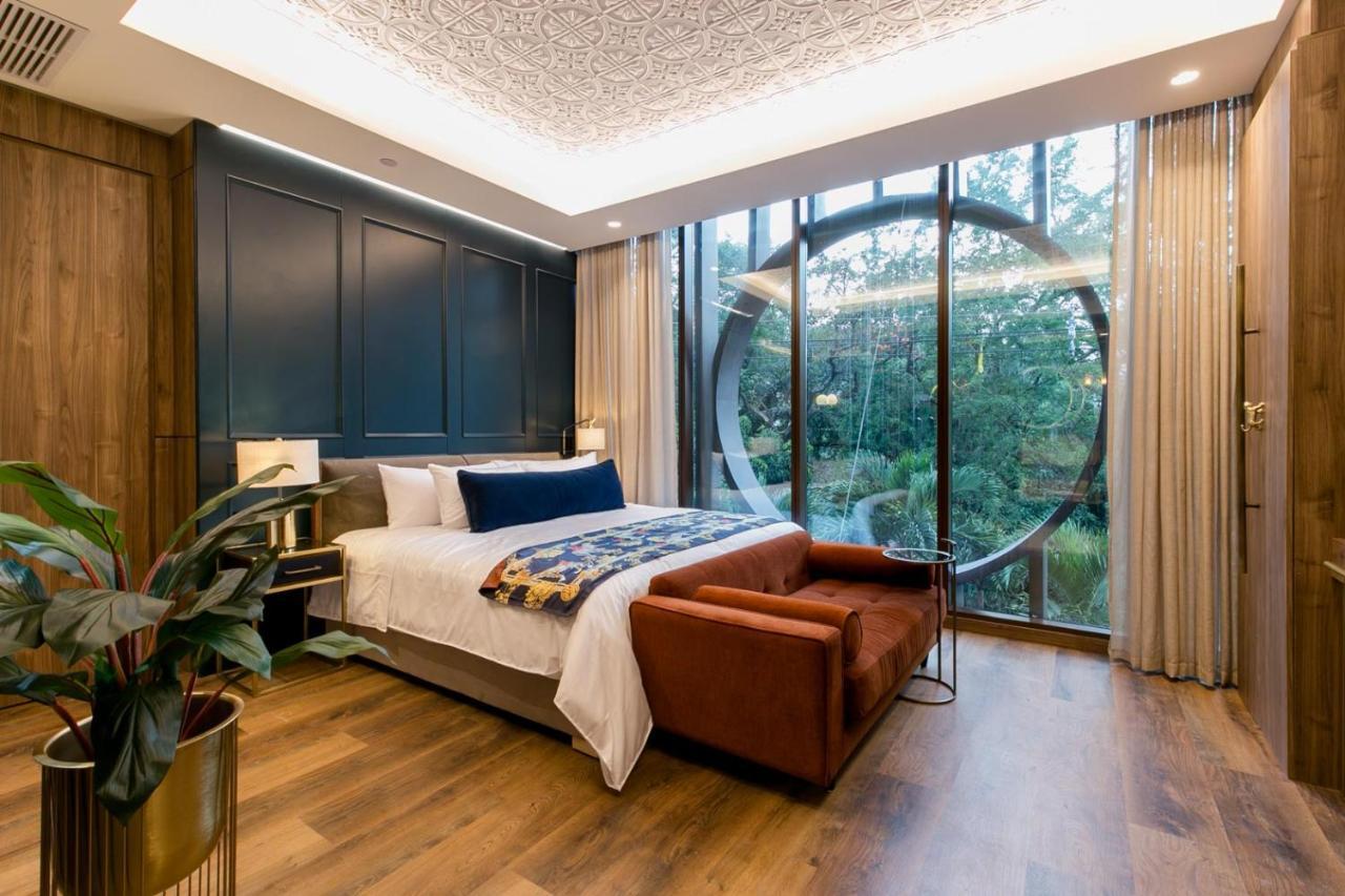 Hotel Marquee Medellin Luaran gambar A bedroom at the hotel
